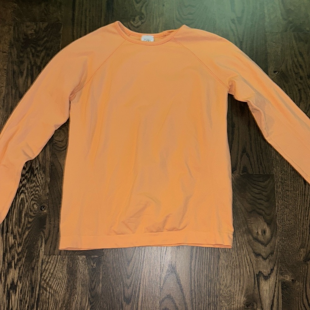 Youth large orange athletic long sleeve.